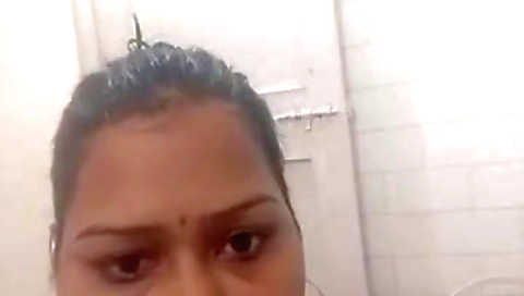 Horny Desi Bhabhi Bathing And Masturbating